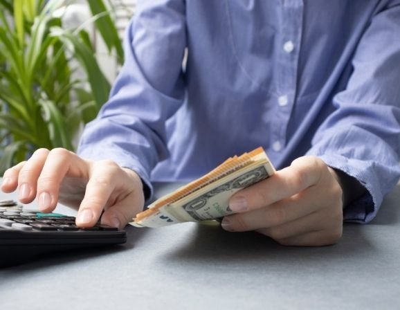 Calculator showing unemployment and furlough pay comparison