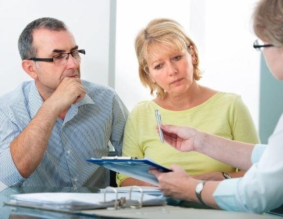 Family discussing ACA premium tax credits
