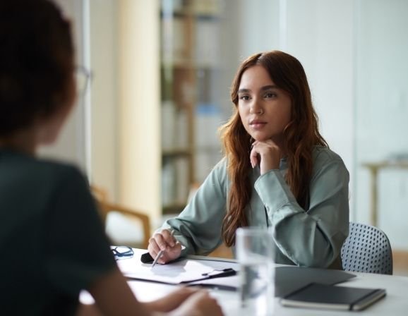 Federal employee discussing benefits with HR